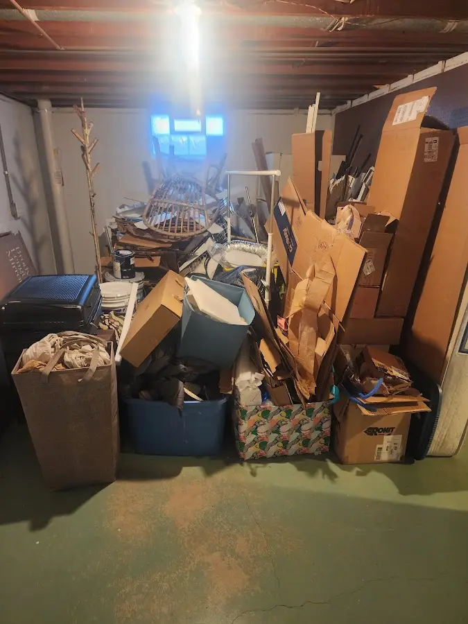 Roll-off dumpster container at job site for 15 Yard Dumpster Rental in Mitchell